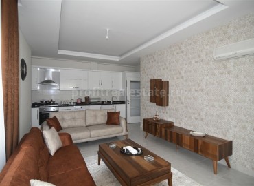 Трехкомнатная квартира в жилом комплексе 2020 года постройки,  в центре Махмутлара, Аланья ID-4801 фото-2