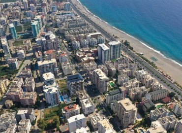 Инвестиционная недвижимость на этапе строительства, всего в 100 метрах от моря,  Махмутлар, Аланья ID-4876 фото-3