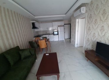 Двухкомнатные апартаменты, с мебелью и техникой, в ухоженном жилом комплексе, Махмутлар, Аланья, 65 м2 ID-4881 фото-2