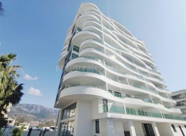 Новые двухкомнатные апартаменты, с большой общей площадью, в 300 метрах от моря, Махмутлар, Аланья ID-4914 фото-1