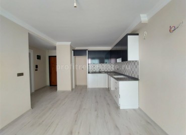 Новые двухкомнатные апартаменты, с большой общей площадью, в 300 метрах от моря, Махмутлар, Аланья ID-4914 фото-2