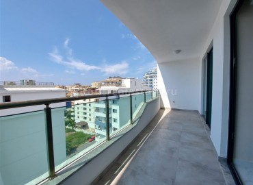 Новые двухкомнатные апартаменты, с большой общей площадью, в 300 метрах от моря, Махмутлар, Аланья ID-4914 фото-7