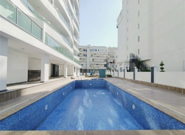 Новые двухкомнатные апартаменты, с большой общей площадью, в 300 метрах от моря, Махмутлар, Аланья ID-4914 фото-12