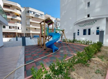 Новые двухкомнатные апартаменты, с большой общей площадью, в 300 метрах от моря, Махмутлар, Аланья ID-4914 фото-16
