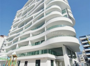 Новые двухкомнатные апартаменты, с большой общей площадью, в 300 метрах от моря, Махмутлар, Аланья ID-4914 фото-18