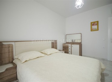 Уютная двухкомнатная квартира, с мебелью и техникой, в 150 метрах от центра аМахмутлара, Аланья ID-4936 фото-11