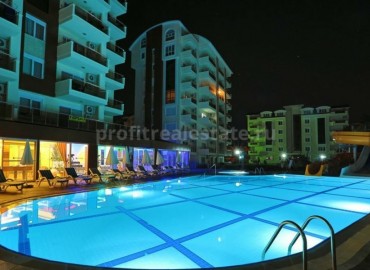 Двухкомнатная квартира в шикарном комплексе в зеленом районе Авсаллар, Алания, 55 м 2 ID-4980 фото-1