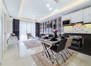 Элегантная двухкомнатная квартира, укомплектованная новой мебелью, в жилом комплексе с богатой инфраструктурой, Махмутлар, Аланья, 65 м2 ID-5031 фото-1