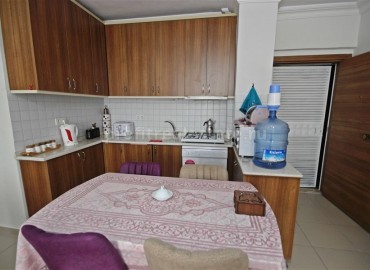 Недорогая двухкомнатная квартира, с мебелью, в 150 метрах от моря, Махмутлар, Аланья ID-5042 фото-12