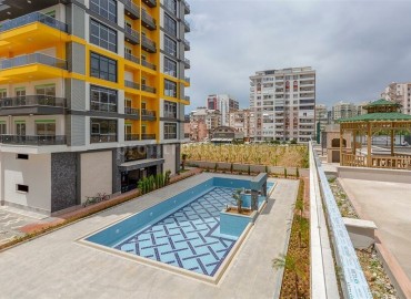 Двухкомнатные апартаменты в жилом комплексе 2020 года постройки,  в Махмутларе, Аланья ID-5096 фото-15