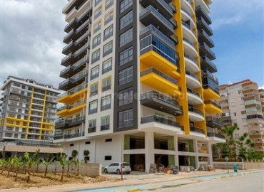 Двухкомнатные апартаменты в жилом комплексе 2020 года постройки,  в Махмутларе, Аланья ID-5096 фото-21