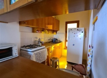 Бюджетные трехкомнатные апартаменты, с отдельной кухней, в 100 метрах от центра Махмутлара, Аланья ID-5107 фото-5}}