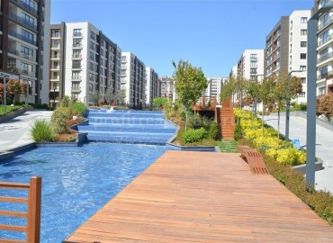 Новые квартиры в роскошном жилом комплексе, в 200 метрах от центра района Бейликдюзю, Стамбул, 92-222 м2 ID-5141 фото-10
