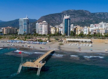 Трехкомнатные апартаменты в элитном комплексе на первой береговой линии в районе Махмутлар ID-5146 фото-1