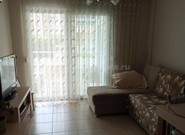 Двухкомнатные апартаменты, с мебелью и техникой, всего в 200 метрах от пляжа Махмутлара, Аланья, 65 м2 ID-5150 фото-2