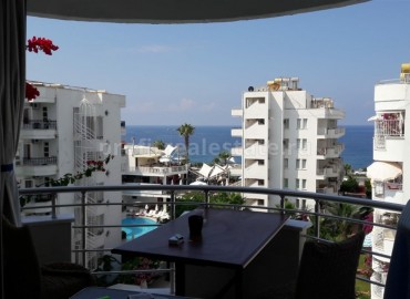 Two-bedroom apartment with sea views, equipped with furniture and appliances, Mahmutlar, Alanya, 100 m2 ID-5263 фото-1}}