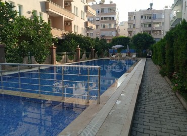 Inexpensive one-bedroom apartment, with furniture and appliances, 100 meters from the center of Mahmutlar, Alanya, 65 m2 ID-5268 фото-1