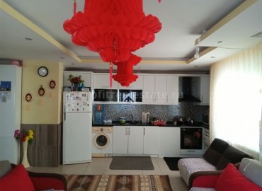 Inexpensive one-bedroom apartment, with furniture and appliances, 100 meters from the center of Mahmutlar, Alanya, 65 m2 ID-5268 фото-4