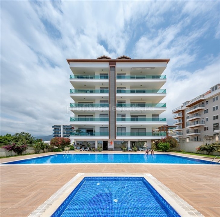 Three-bedroom duplex, with furniture and appliances, in a well-kept residential complex with excellent facilities, just 200 meters from the Kestel beach, Alanya ID-5284 фото-1