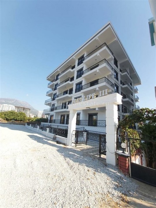 One-bedroom apartment, in fine finish, in a residential complex built in 2020, in the center of Mahmutlar ID-5298 фото-1