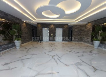 One-bedroom apartment, in fine finish, in a residential complex built in 2020, in the center of Mahmutlar ID-5298 фото-8}}
