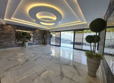 One-bedroom apartment, in fine finish, in a residential complex built in 2020, in the center of Mahmutlar ID-5298 фото-9}}