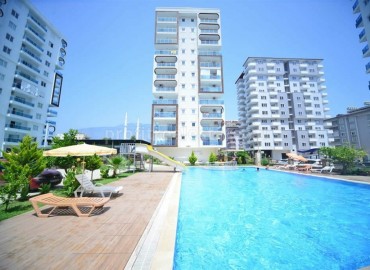 Spacious two-room apartment, equipped with furniture and appliances, in a well-maintained residential complex Mahmutlar, Alanya, 70 m2 ID-5302 фото-1