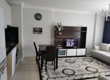 Spacious two-room apartment, equipped with furniture and appliances, in a well-maintained residential complex Mahmutlar, Alanya, 70 m2 ID-5302 фото-2