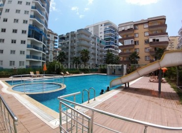 Spacious two-room apartment, equipped with furniture and appliances, in a well-maintained residential complex Mahmutlar, Alanya, 70 m2 ID-5302 фото-8