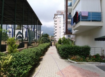 Spacious two-room apartment, equipped with furniture and appliances, in a well-maintained residential complex Mahmutlar, Alanya, 70 m2 ID-5302 фото-14