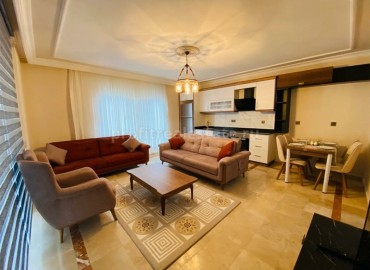 Spacious 1 + 1 apartment with an area of 70m2, in the prestigious European district of Oba, Alanya ID-5308 фото-1