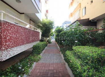 Spacious 1 + 1 apartment with an area of 70m2, in the prestigious European district of Oba, Alanya ID-5308 фото-11