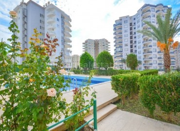 Inexpensive two-bedroom apartment, with furniture and appliances, in a picturesque area of Mahmutlar, Alanya, 110 m2 ID-5333 фото-1