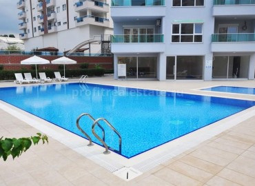 New 1 + 1 apartment 60 m2 in Mahmutlar at an affordable price, completely ready to move in ID-5360 фото-12
