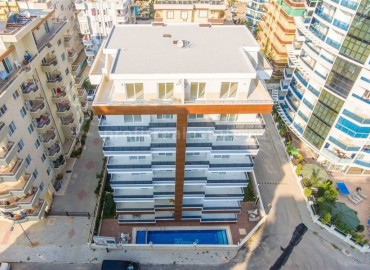 Inexpensive one-bedroom apartment, with a large total area, just 250 meters from the sea, Mahmutlar, Alanya ID-5372 фото-2