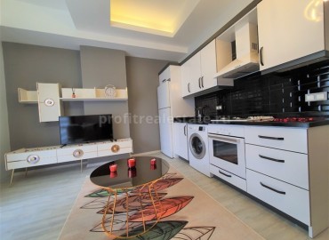 Stylish one-bedroom apartment, with furniture and appliances, in the new residence of Mahmutlar, Alanya, 47 m2 ID-5375 фото-4