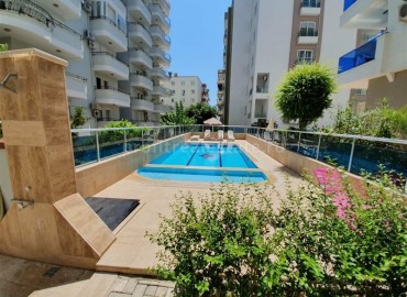 Spacious three-room apartment, with furniture and appliances, 250 meters from the sea Mahmutlar, Alanya ID-5379 фото-18