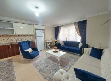 Cozy three-room apartment, equipped with furniture and appliances, just 150 meters from the sea, Mahmutlar, Alanya, 110 m2 ID-5380 фото-2