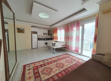 Inexpensive one-bedroom apartment with furniture and appliances, 400 meters from the sea, Mahmutlar, Alanya, 75 m2 ID-5418 фото-4