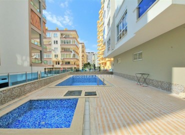 Stylish two-room apartment, equipped with furniture and appliances, 200 meters from the center of Mahmutlar, 78 m2 ID-5447 фото-19