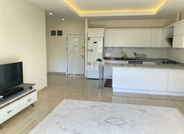 Spacious one-bedroom apartment in a well-kept residential complex in Oba, Alanya, 70 m2 ID-5448 фото-3