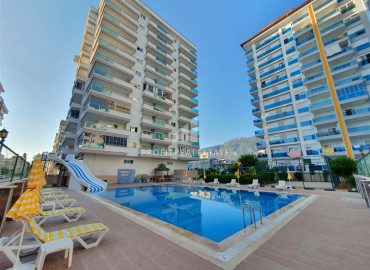 Two-room apartment, with furniture and appliances, next to the sea and 150 meters from the center of Mahmutlar, Alanya ID-5472 фото-2