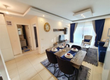 Two-room apartment, with furniture and appliances, next to the sea and 150 meters from the center of Mahmutlar, Alanya ID-5472 фото-6