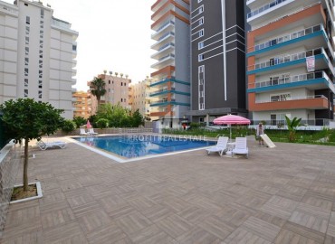 Apartment in a new building with a 1 + 1 layout with a large total area, 150 meters from the center of Mahmutlar, 88 m2 ID-5484 фото-1