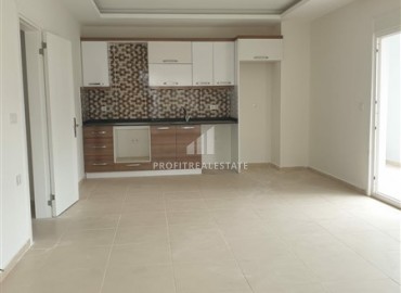 Apartment in a new building with a 1 + 1 layout with a large total area, 150 meters from the center of Mahmutlar, 88 m2 ID-5484 фото-3