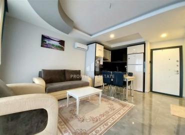 Furnished one-bedroom apartment, with a large total area, 400 meters from the sea, Mahmutlar, Alanya ID-5506 фото-3