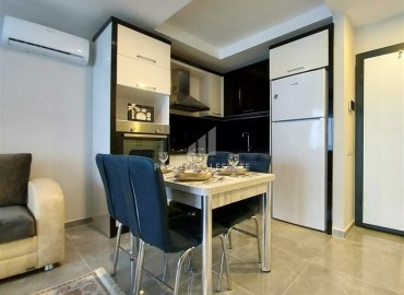 Меблированные двухкомнатные апартаменты, с большой общей площадью, в 400 метрах от моря, Махмутлар, Аланья ID-5506 фото-5