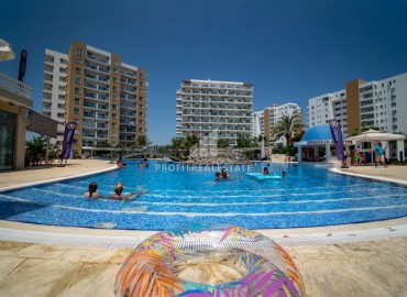 Двухкомнатные и трехкомнатные квартиры, на этапе строительства, в шикарном жилом комплексе, Искеле, Кипр, 65-76 м2 ID-5519 фото-2