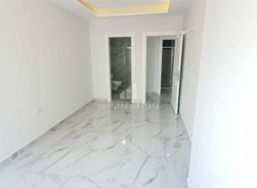 Two-bedroom apartment, finely finished, just 150 meters from the center of Mahmutlar, Alanya ID-5542 фото-9