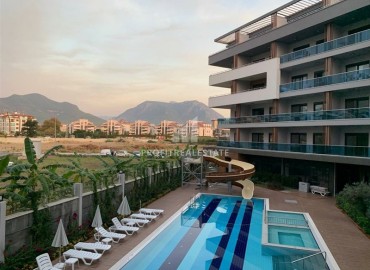 Cozy two-room apartment, furnished, in a residence with rich infrastructure, Oba, Alanya, 56 m2 ID-5547 фото-1